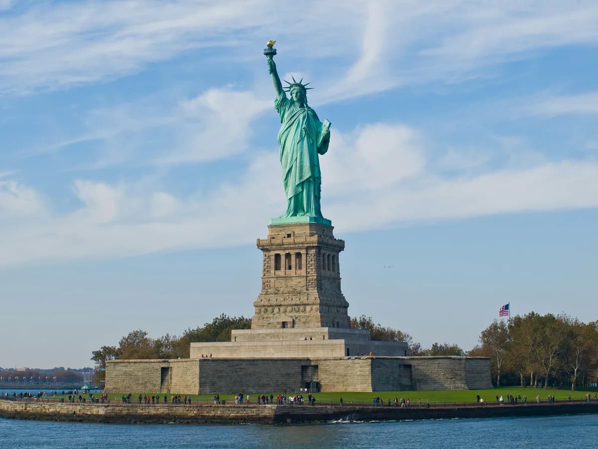 The Statue of Liberty from the ferry rail